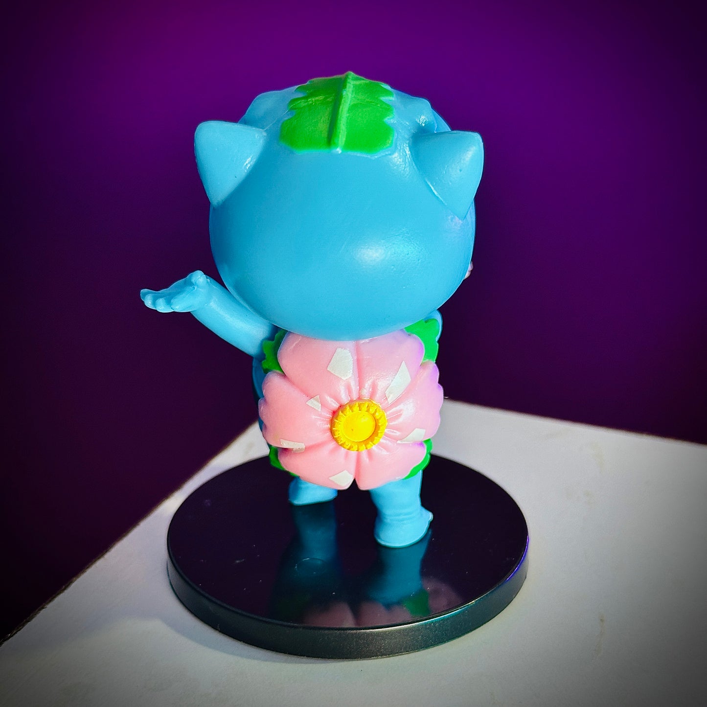 Mini Shinchan collectible dressed as Bulbasaur Pokémon character toy