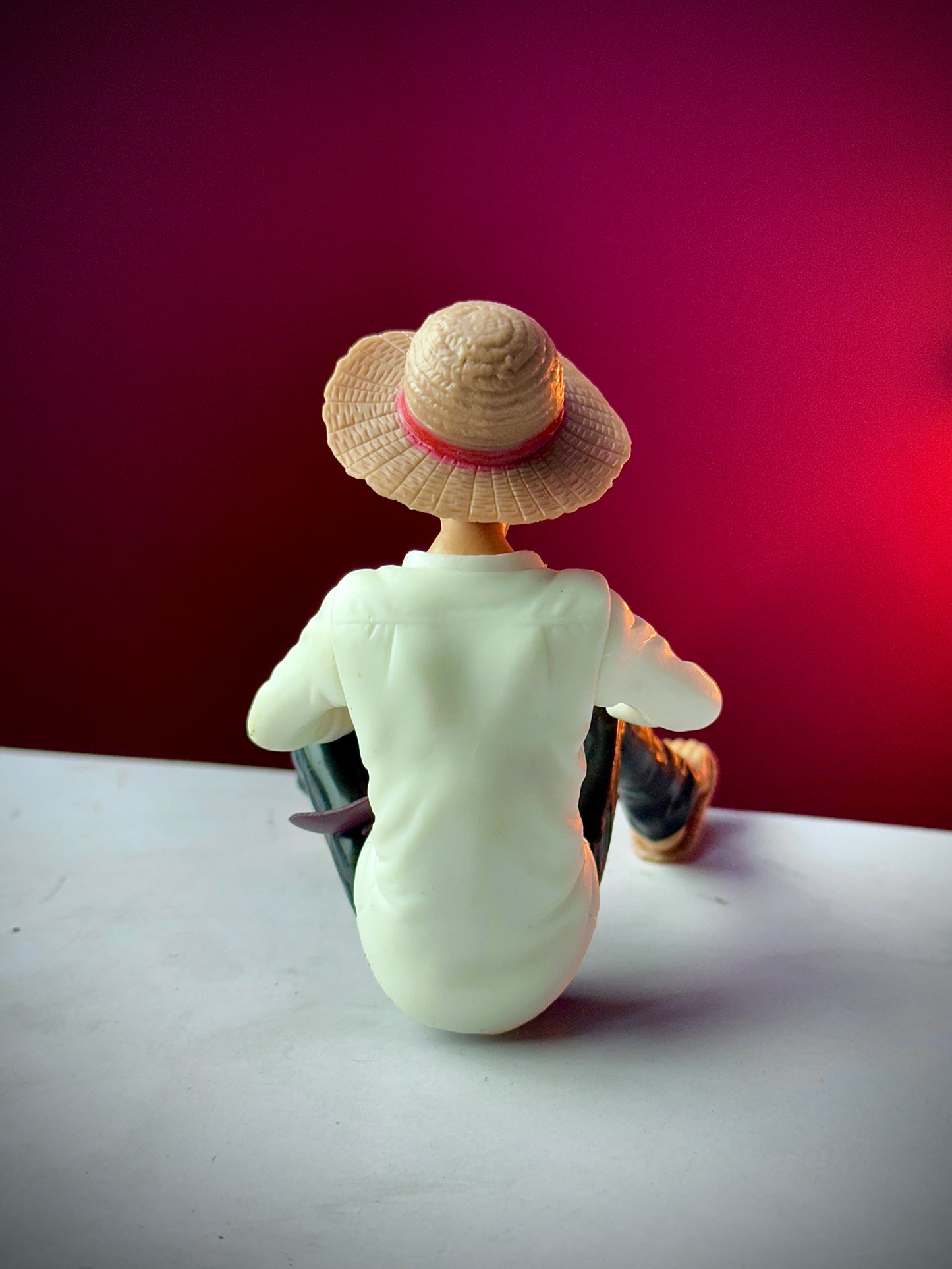 Sitting Monkey D. Luffy Action Figure – One Piece Anime Collectible (White Outfit)