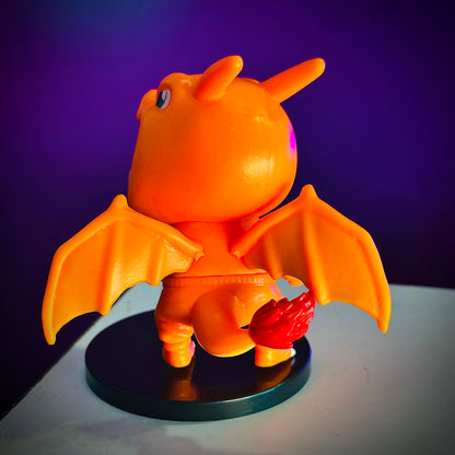 Mini Shinchan collectible dressed as Charizard anime character toy