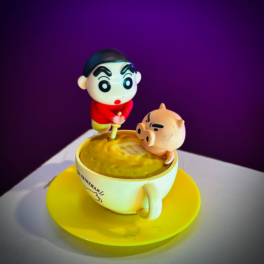 Shinchan Restro Scene collectible with piggy sitting in a cup on yellow base

