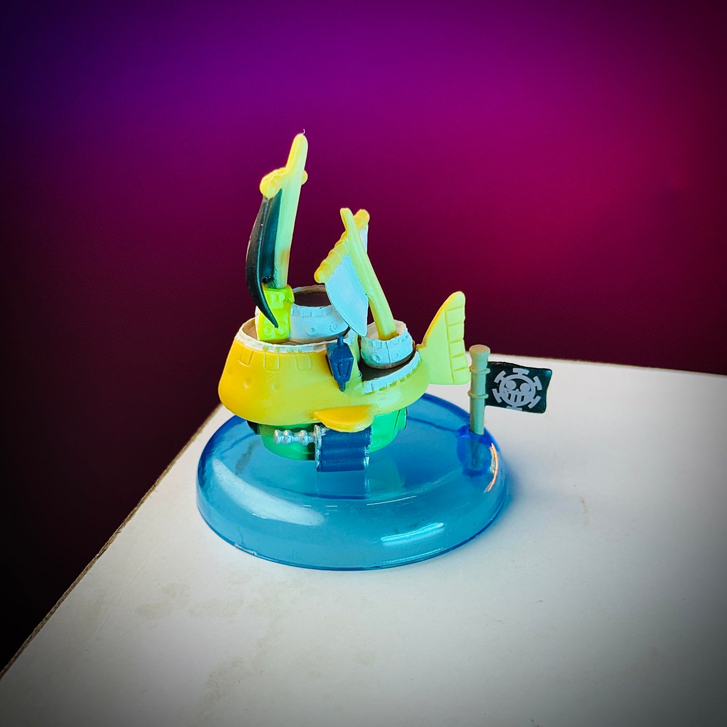 yellow submarine anime ship on blue base