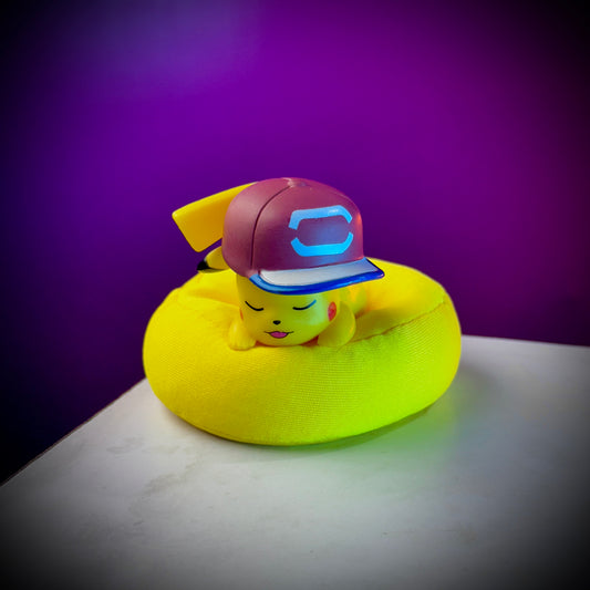 Sleeping Pikachu anime figure wearing cap cute Pokemon collectible toy