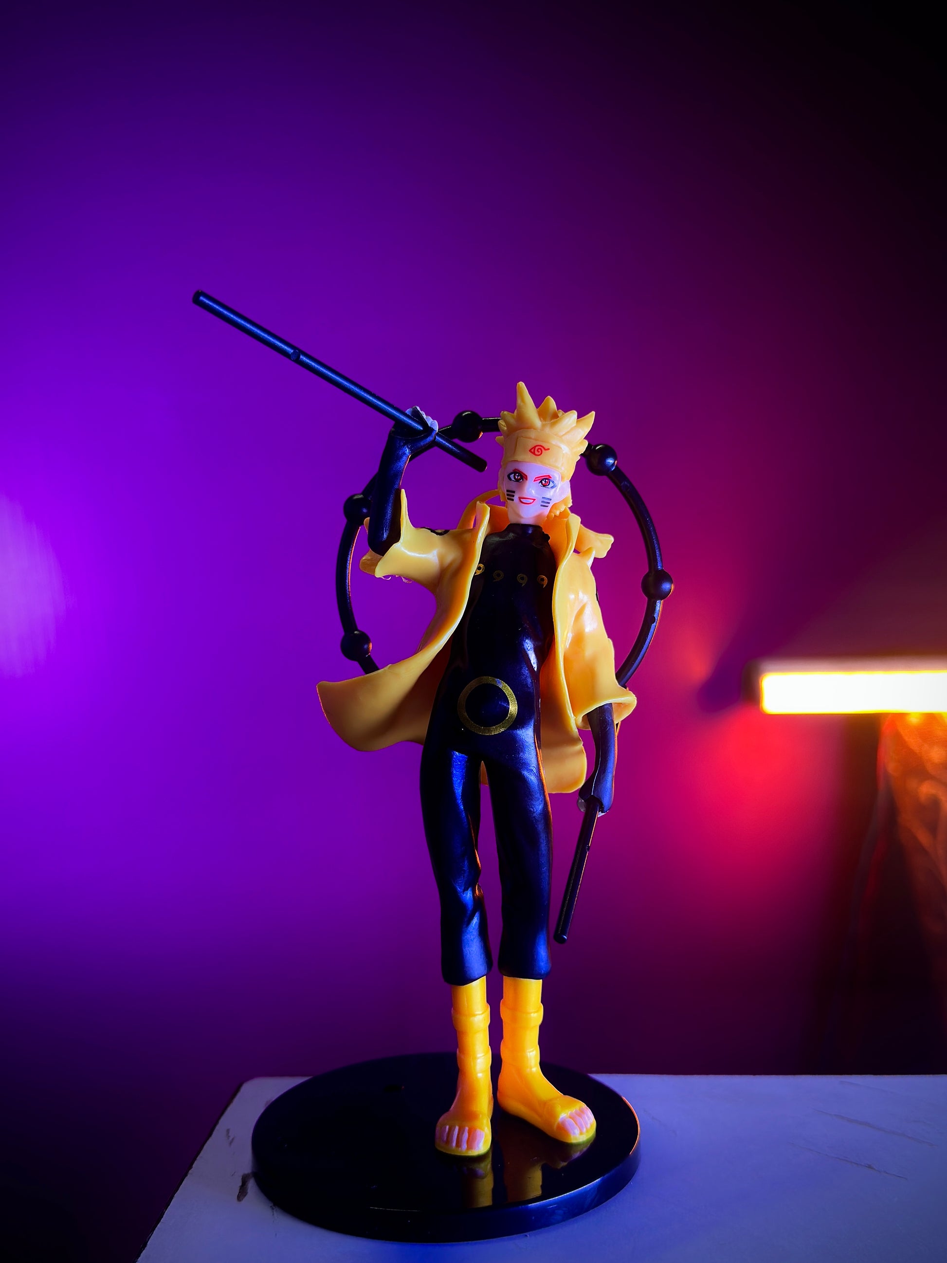 Action figure with a purple background