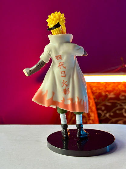 Naruto character Minato Namikaze figure wearing Hokage cloak standing on base