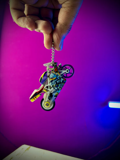 Sparkling motorcycle keychain with premium metal finish.

