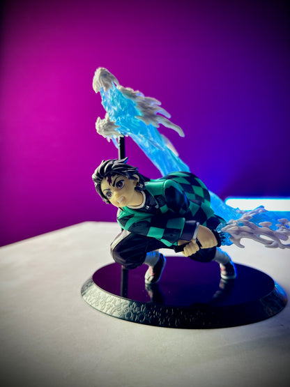 Tanjiro action pose anime figure with blue water effect
