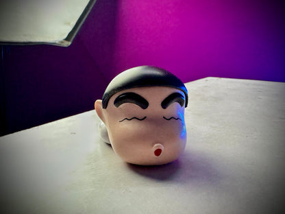 Premium Shinchan PVC figure with soft-touch detailing.