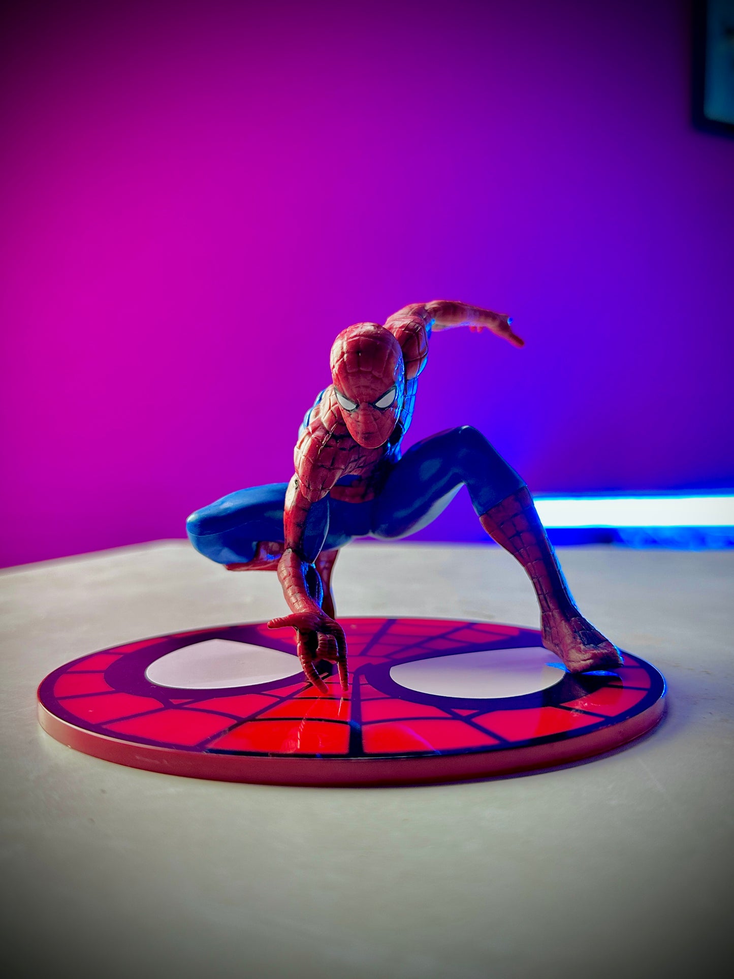 Spider-Man amazing action figure in dynamic crouching superhero pose.
