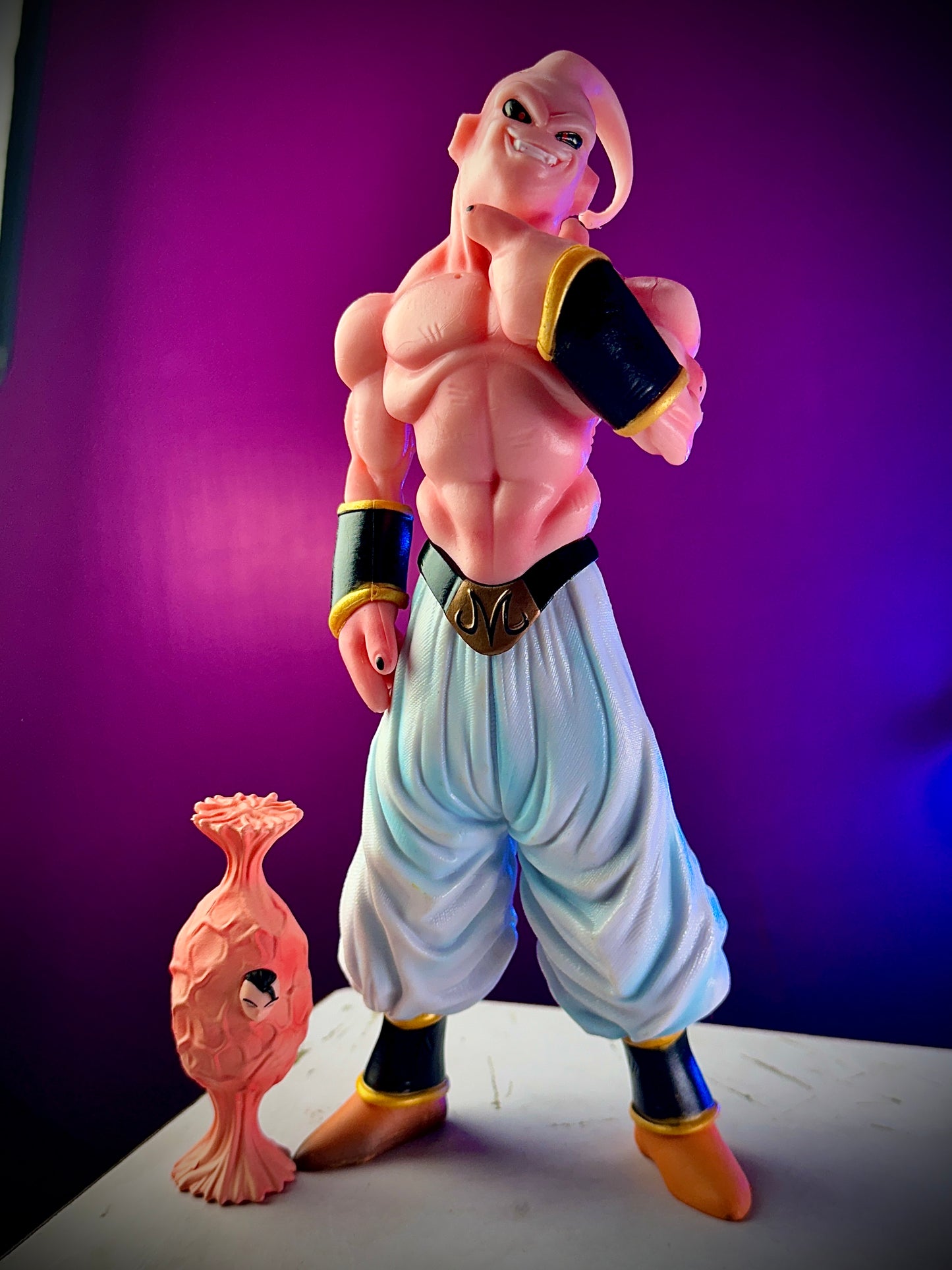 Majin Buu anime collectible statue with evil grin expression