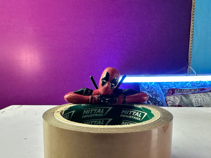 Detailed Deadpool PVC collectible figures with comic styling
