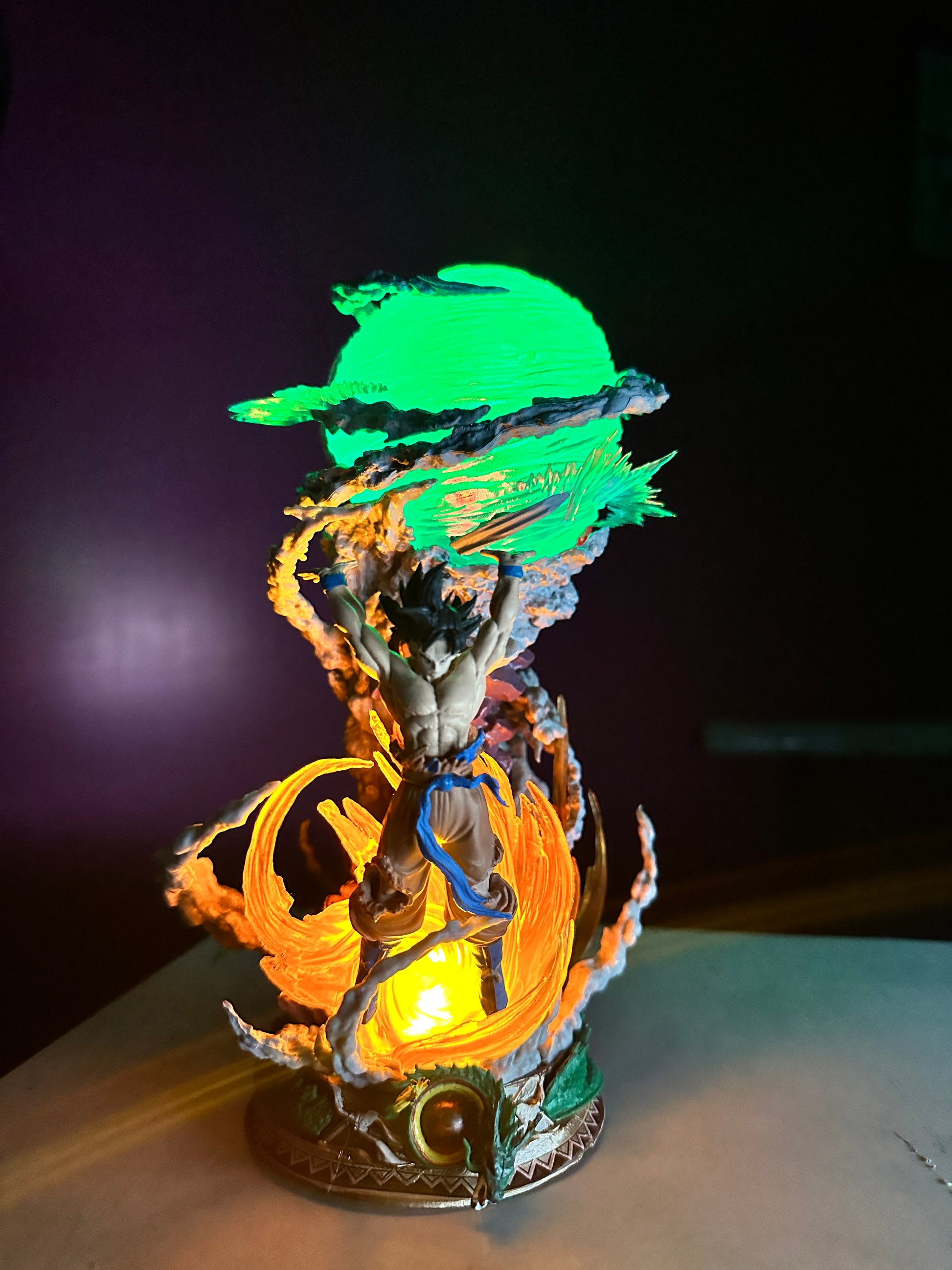 Detailed Goku anime statue holding giant Spirit Bomb