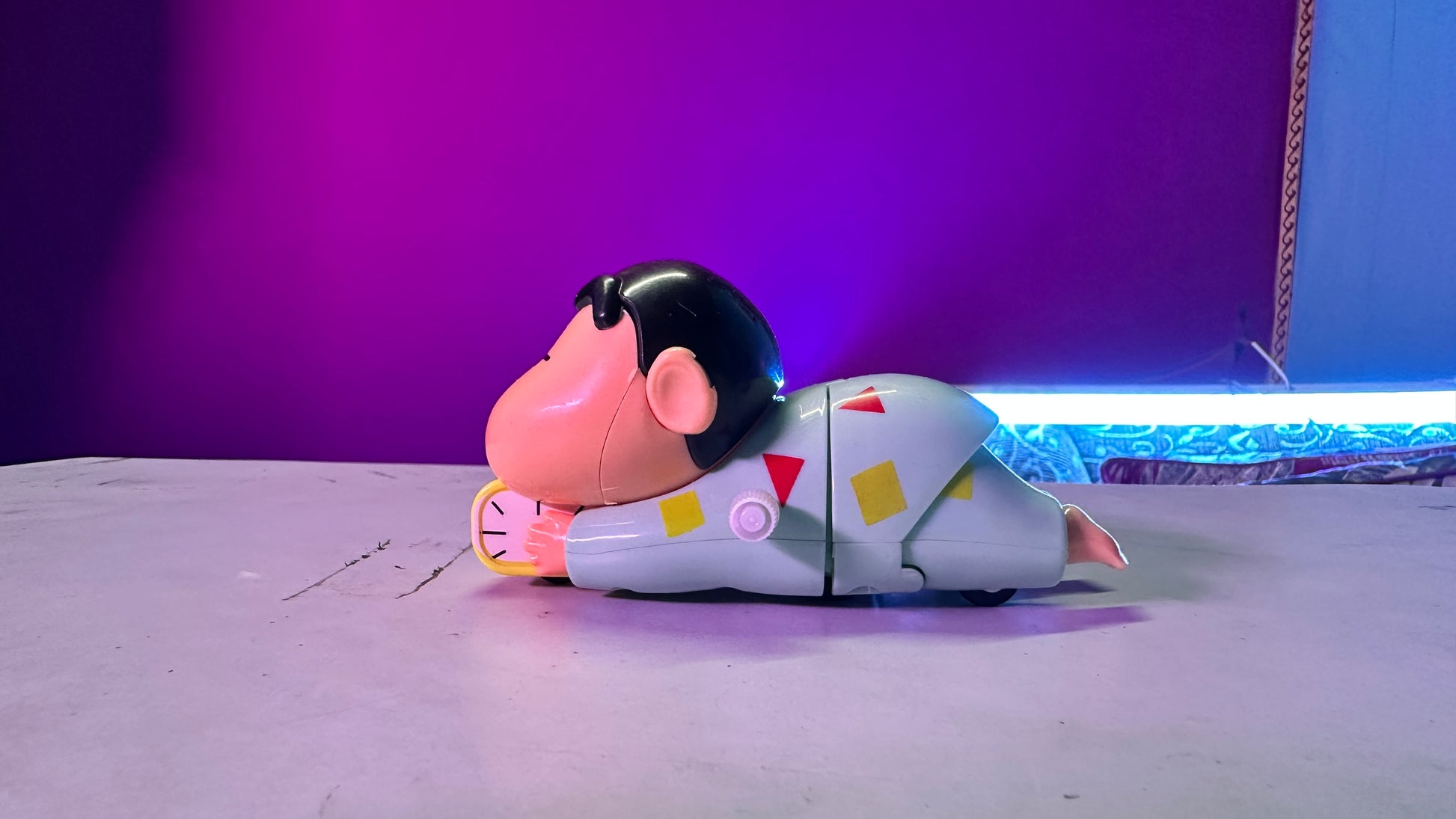 Shinchan green crawling PVC figure with cute anime styling.