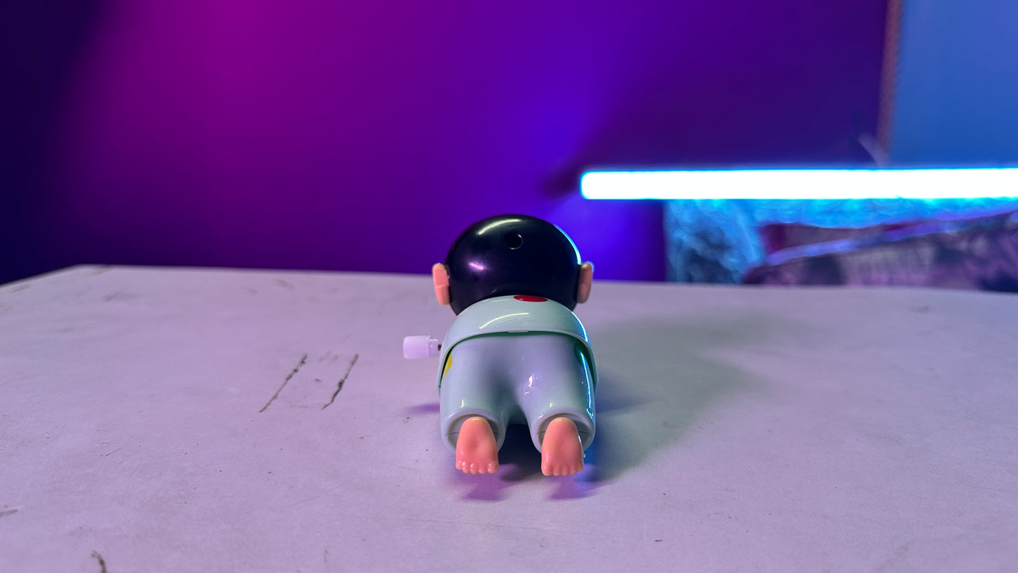 Shinchan anime desk decoration in green outfit