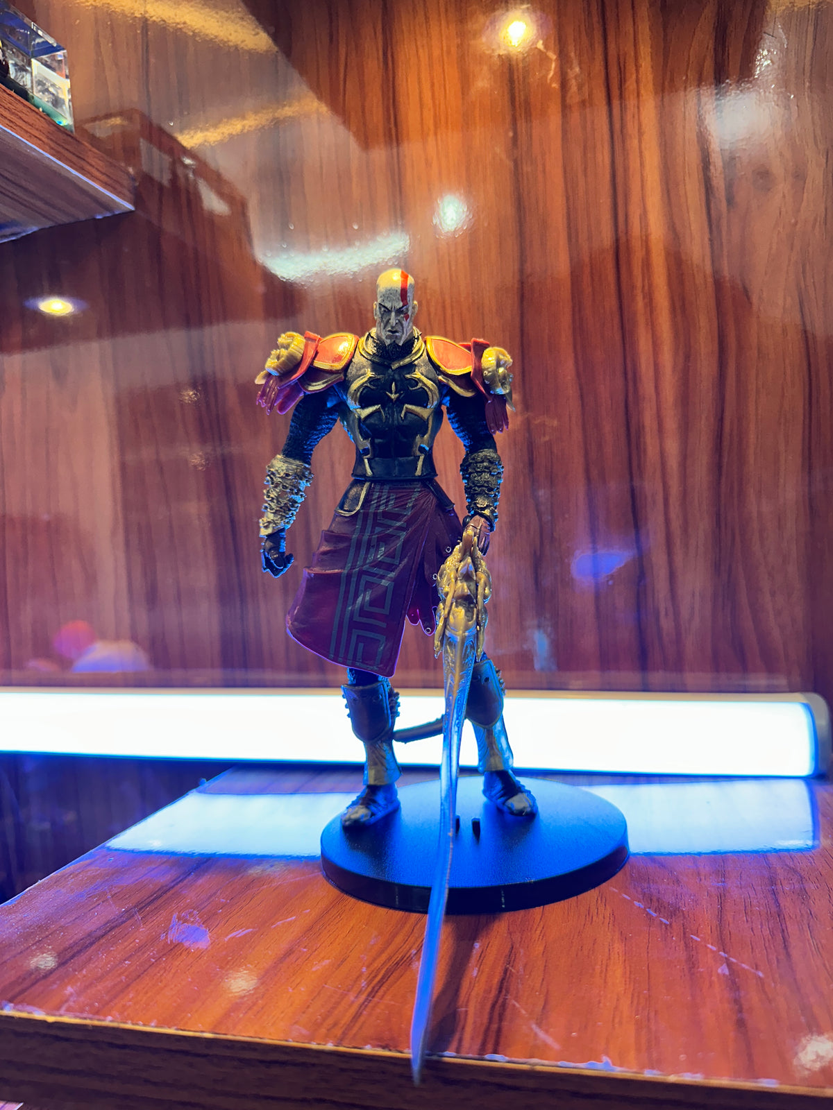19CM God of War Kratos action figure holding a large sword on a display base.