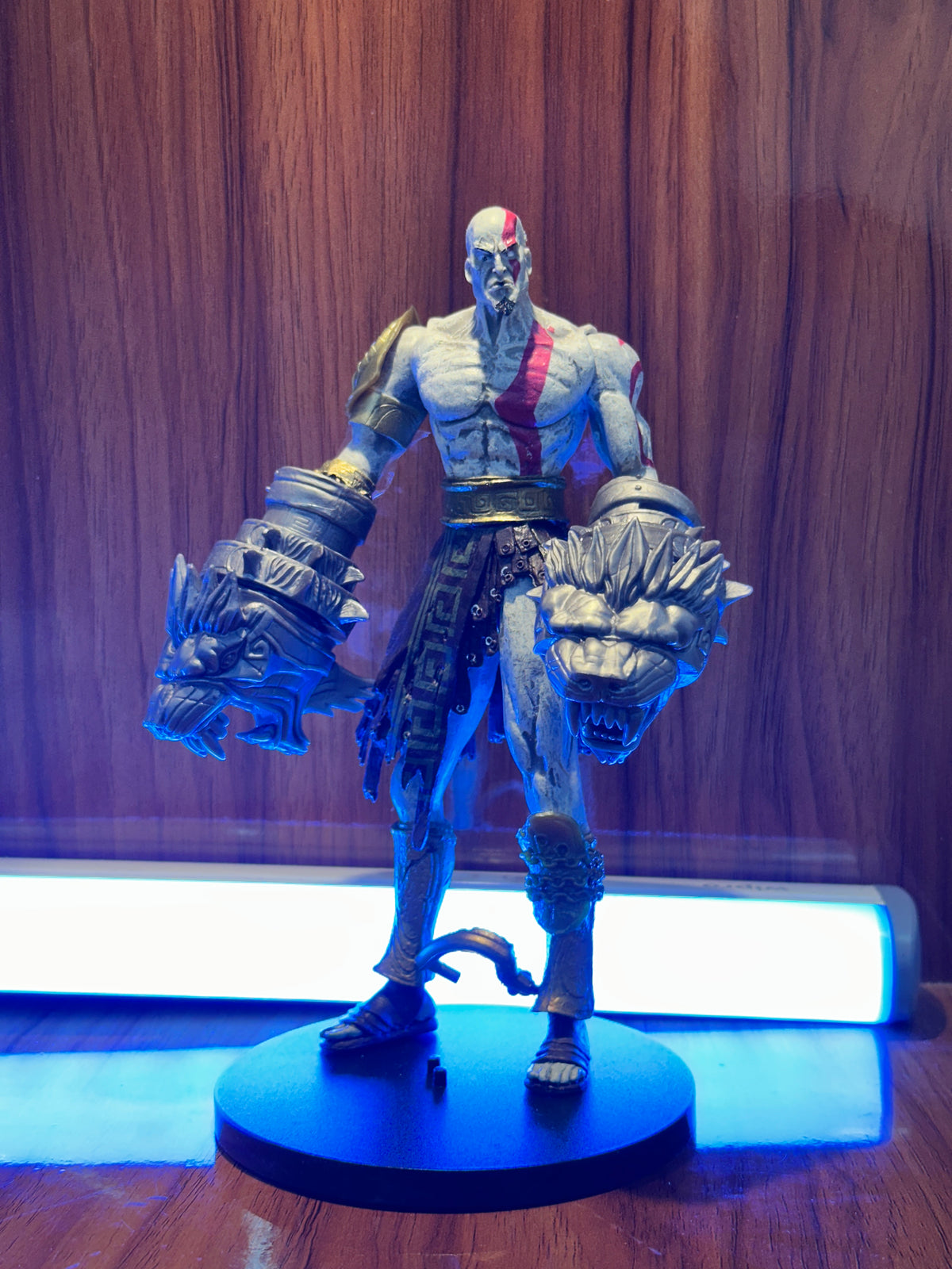 Kratos action figure with Hercules Nemean Cestus lion-head gauntlets inspired by God of War 3.
