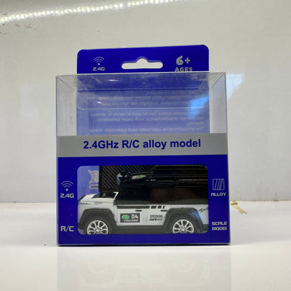 2.4GHz rechargeable remote control car for kids featuring a black and white mini SUV design.