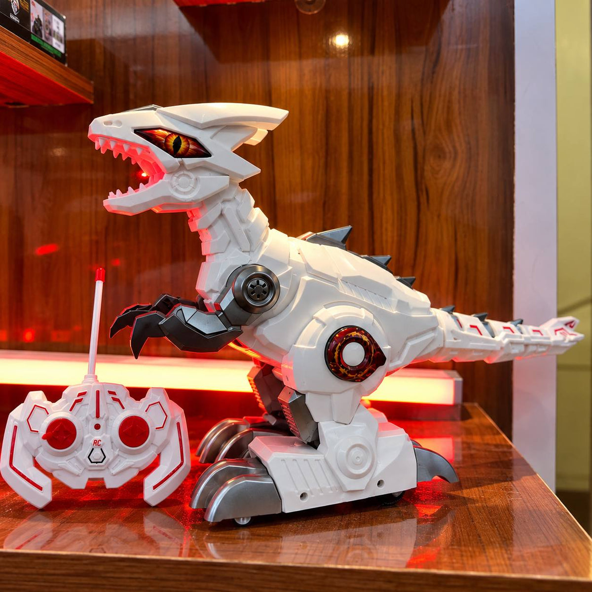 Remote control dinosaur toy with 360-degree rotation and multi-directional movement
