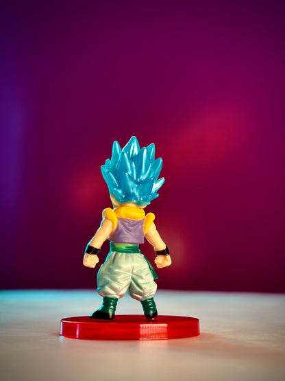 Toy figure with blue hair on a red base against a purple background